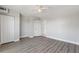 Bedroom features laminate floors, neutral walls, and ample closet space at 3315 58Th S Ave # 314, St Petersburg, FL 33712