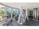 Spacious fitness center featuring cardio machines, weights, and natural light at 3315 58Th S Ave # 314, St Petersburg, FL 33712