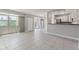 Spacious living area with tile flooring and a view of the balcony at 3315 58Th S Ave # 314, St Petersburg, FL 33712