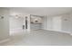 Open-concept living area with tile flooring, connecting the kitchen and dining spaces at 3315 58Th S Ave # 314, St Petersburg, FL 33712
