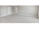 Large living space with tile flooring, ready for personalization and decor at 3315 58Th S Ave # 314, St Petersburg, FL 33712