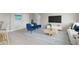 Living room with comfortable seating, modern decor, and bright lighting at 3315 58Th S Ave # 314, St Petersburg, FL 33712