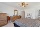 Inviting bedroom with neutral walls, tiled flooring, and ample natural light from an adjacent doorway and window at 4400 37Th S St # 2, St Petersburg, FL 33711