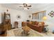 Inviting living room with a comfortable sofa, a unique coffee table, and a large display cabinet, perfect for relaxation at 4400 37Th S St # 2, St Petersburg, FL 33711