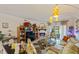 Comfortable living room with decorative fireplace, stylish furnishings, and bright lighting at 4400 37Th S St # 2, St Petersburg, FL 33711