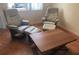 Cozy living room with two recliners, foot rests, and wooden coffee table at 4715 Bay Ne St # 133, St Petersburg, FL 33703