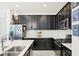 Stylish kitchen with stainless steel appliances and subway tile backsplash at 6251 Camino Dr, Apollo Beach, FL 33572