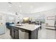 Open-concept kitchen, dining, and living area provides a seamless flow at 6251 Camino Dr, Apollo Beach, FL 33572