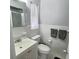 Updated bathroom featuring a new sink vanity, tiled floors, and shower with updated hardware at 6398 17Th N Pl, St Petersburg, FL 33710