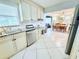 Functional kitchen featuring sleek stainless steel appliances, marble countertops, and ample storage, designed for convenience at 6398 17Th N Pl, St Petersburg, FL 33710