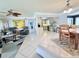 Open-concept layout with tile flooring connecting the living, dining, and kitchen areas, great for entertaining at 6398 17Th N Pl, St Petersburg, FL 33710
