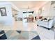 Open layout with view from the living room towards the dining area and a glimpse of the modern kitchen at 6398 17Th N Pl, St Petersburg, FL 33710