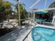 This enclosed in-ground pool is perfect for entertaining or enjoying a refreshing swim at 6398 17Th N Pl, St Petersburg, FL 33710