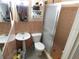 Bathroom with tile floors, vanity, and walk in shower at 7124 Jasmin Dr, New Port Richey, FL 34652