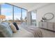Bright main bedroom featuring a large window with city views, and modern decor at 777 3Rd N Ave # 805, St Petersburg, FL 33701