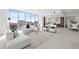 Spacious open-concept layout with stunning city views, modern furnishings, and a bright, airy atmosphere at 777 3Rd N Ave # 805, St Petersburg, FL 33701
