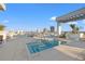 Inviting rooftop spa pool with city views and comfortable lounge seating for relaxation at 777 3Rd N Ave # 805, St Petersburg, FL 33701