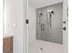 Modern shower featuring gray and white tiling with black hardware and a glass enclosure at 777 3Rd N Ave # 805, St Petersburg, FL 33701