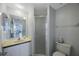 Clean bathroom features a single sink vanity and a walk-in shower with glass door at 7922 Sailboat Key S Blvd # 503, South Pasadena, FL 33707