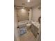 Bright bathroom with a shower-tub combo and a stylish vanity with sink at 10033 64Th N Ave # 9, St Petersburg, FL 33708
