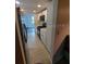 Newly renovated kitchen featuring white cabinets, stainless steel appliances, and modern finishes at 10033 64Th N Ave # 9, St Petersburg, FL 33708