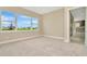 Spacious bedroom filled with natural light and a view of the neighborhood, perfect for relaxation and comfort at 10432 Torchwood Sea Way, San Antonio, FL 33576