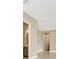 Hallway view featuring doorway to bathroom and hallway, recessed lighting at 10432 Torchwood Sea Way, San Antonio, FL 33576