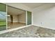 Covered patio with interlocking brick floor, seamlessly connecting indoor and outdoor living spaces at 10432 Torchwood Sea Way, San Antonio, FL 33576