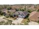 Aerial view of the house shows its location surrounded by lush landscaping and neighborhood charm at 10537 Greensprings Dr, Tampa, FL 33626