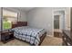 Bedroom with a window and closets at 10537 Greensprings Dr, Tampa, FL 33626