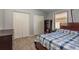 Bedroom with closets and a window at 10537 Greensprings Dr, Tampa, FL 33626