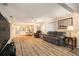Open living area with wood floors, modern furniture, and plenty of natural light at 11200 102Nd Ave # 16, Seminole, FL 33778