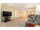 Bright living room with hardwood floors, comfortable seating, and an open floor plan at 11200 102Nd Ave # 16, Seminole, FL 33778