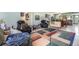 Spacious living room featuring comfortable seating, a colorful rug, and an open layout at 127 Tidewater Dr # 127, Bradenton, FL 34210