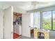 An office features a laundry nook, desk and a large window at 127 Tidewater Dr # 127, Bradenton, FL 34210