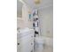Cozy bathroom with white fixtures, vanity, and shower with a charming cat-themed curtain at 128 Nancy Dr # 128, Oldsmar, FL 34677