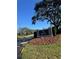 Ardea Country Club entrance sign with manicured landscaping and clear blue skies at 128 Nancy Dr # 128, Oldsmar, FL 34677