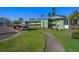Well-maintained condo complex with ample parking and landscaped grounds at 128 Nancy Dr # 128, Oldsmar, FL 34677