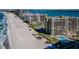 Gorgeous aerial showcasing beachfront condos with a beautiful beach and pool at 1480 Gulf Blvd # 410, Clearwater Beach, FL 33767