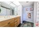 Well-lit bathroom with double vanity and decorative accents at 1480 Gulf Blvd # 410, Clearwater Beach, FL 33767