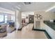 Spacious common area offering seating, dining areas, and a black granite bar at 1480 Gulf Blvd # 410, Clearwater Beach, FL 33767