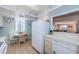 Functional kitchen with breakfast nook and open view to living area at 1480 Gulf Blvd # 410, Clearwater Beach, FL 33767
