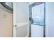 Convenient laundry area featuring a stacked washer and dryer unit at 1480 Gulf Blvd # 410, Clearwater Beach, FL 33767