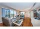 Bright living room featuring balcony access, offering stunning beach and ocean views, perfect for relaxation and entertainment at 1480 Gulf Blvd # 410, Clearwater Beach, FL 33767