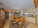 Elegant dining room featuring a wooden table set and a partial view of the kitchen at 1520 S Richard Ave, Tampa, FL 33629