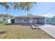 Charming single-story home with a covered carport and welcoming front entrance at 1520 S Richard Ave, Tampa, FL 33629