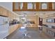 Well-lit kitchen featuring a granite countertop island and view of the sink and appliances at 1520 S Richard Ave, Tampa, FL 33629