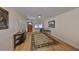 Comfortable living space featuring a decorative rug, hardwood floors, and neutral wall colors at 1520 S Richard Ave, Tampa, FL 33629