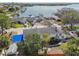 An aerial view highlighting the home's location in a waterfront community with city skyline views at 19 Sandpiper Rd, Tampa, FL 33609