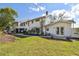 Expansive backyard perfect for outdoor entertaining, featuring a lush lawn, patio, and ample space at 19 Sandpiper Rd, Tampa, FL 33609